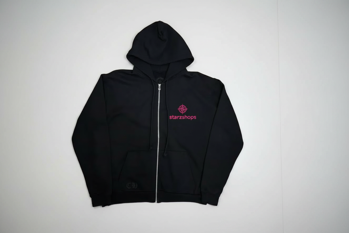 Black zip up jacket with starzshops logo on white table